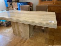 Full view of rectangular tabletop and central pedestal base, showing overall shape and size