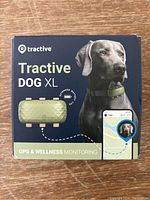Photo of original unopened Tractive Dog XL GPS tracker in box with product branding and usage details visible.