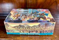 Closed box of The Lord of the Rings: Tales of Middle-Earth draft boosters with artwork on front.