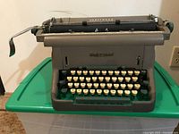 Front angled view of the Underwood manual typewriter showing keyboard and brand name.