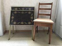Photo of two vintage TV trays and one vintage wooden desk chair with vinyl cushion showing general condition and scale.