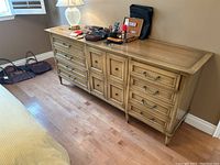 Front-left view of dresser showing full length and drawer arrangement