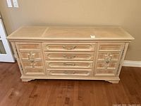 Front view of hutch showing four drawers and two cabinet doors