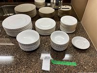Overview of all stacked plates, bowls and saucers