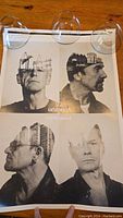Poster featuring black and white portraits of U2 band members with architectural overlays.