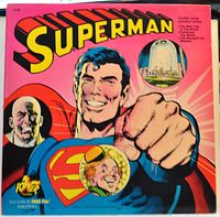 Front cover of the Superman LP album with colorful artwork and three story highlights.