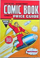 Front cover of the 2015 Overstreet Comic Book Price Guide Number 34 with illustration of a superhero on a rocket and prominent title text.