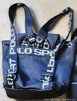 Photo of black Polo Sport small backpack with white Polo Sport branded straps