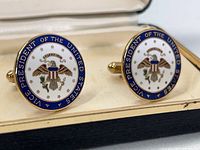 Pair of souvenir Vice President of the United States enamel cuff links in a hard shell case.