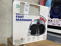 Box photo showing Belmint Shiatsu Foot Massager with Heat, model Press Escape, in white box with product image and description.