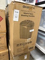 Box of Deco Home Portable 13lbs Twin Tub Wash & Spin Washing Machine showing front with label and product image.