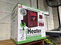 Photo of front of box showing iHeater Quartz Infrared Heater branding, features, and power rating IH-1500W.