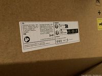 Close-up of importer and compliance label on box showing IKEA distribution details for CL, France and Italy