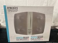 Front view of HoMedics Shiatsu Select Foot Massager box showing product image and branding.