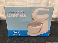 Box showing Everyday Essentials logo, product image, and 'Stand Mixer' label