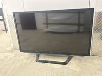 Front view of LG TV on stand