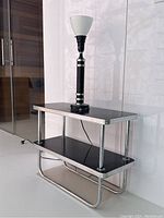 Full view of two-tier side table with integrated lamp on top surface