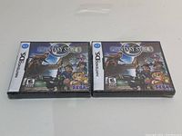 Overhead shot of two sealed game cases side by side showing front covers