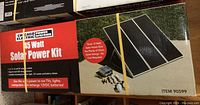 Box front showing Chicago Electric branding, 45 Watt Solar Power Kit title and three solar panels image