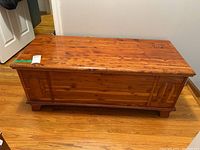 Front view of the rectangular Lane cedar chest showing top and decorative panels on front and sides.