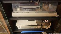 Top view showing Technics SL-B5 turntable on upper shelf and M228X cassette deck below