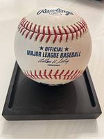 Top view of the Rawlings official Major League Baseball showing brand and official markings with commissioner's signature.