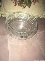 Top and interior view of clear Bohemian crystal bowl showing geometric square cuts.