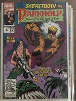 Front cover of Sabertooth Vs Darkhold Comic #4 by Marvel, dated November 1992, showing characters Sabertooth and a woman with a large gun, along with monsters and text.