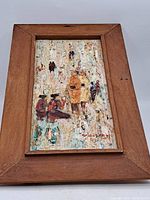 Full view of the vintage oil painting in wooden frame showing impressionistic group scene with heavy texture and thick paint application.