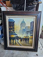 Full view of framed acrylic painting showing street scene with pedestrians, horse carriage, trolley, and buildings including a domed structure.
