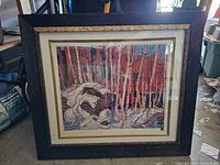 Framed print of a winter landscape with birch trees titled 'Fresh Snow' after Tom Thomson.