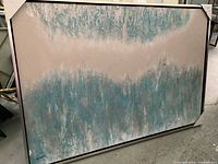 Full view of large abstract framed textured painting showing overall condition and color scheme of blue, beige, and gray.