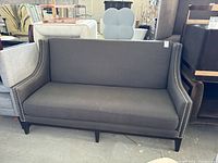Front view of dark gray sofa