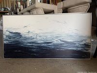 Full frontal view of the abstract seascape canvas print with visible scratches and marks.