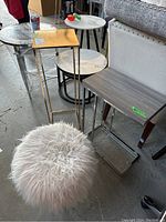 Gold side table, wood top side table, and fur stool grouped
