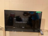 Front view of Seiki flat screen television showing screen and Seiki logo on bottom bezel.