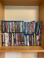 Wide shot showing full spread of DVDs and Blu-rays arranged on a shelf