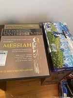 Photo showing LP records including Handel's Messiah, Ludwig van Beethoven symphonies, and The Sound of Music Blu-Ray set boxed.