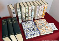 Front view of all 15 hardcover books including full set of 12 Arthur Ransome Swallows and Amazons series books plus 3 additional John Galsworthy books