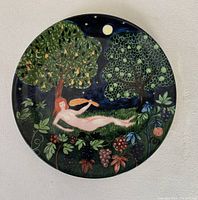 Front of the vintage plate showing handpainted Virgo zodiac scene with a reclining nude woman, trees, and night sky.