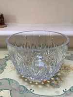 Top angle view of the deep Waterford crystal bowl showing cut pattern and internal depth.
