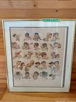 Overall view of framed artwork showing full print, mat and frame.