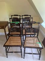 Six Hitchcock-style pillowback chairs arranged in two rows