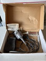 Overview of the entire lot including rotary tool motor, foot pedal, user manual, small accessories and lubricant tube.