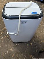 Front view of the Black & Decker portable AC and heater showing power cord and logo