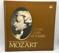 Front view of the brown hardcover box with a classical profile image of Mozart and gold lettering 'Great Men of Music' and 'Wolfgang Amadeus Mozart' by Time Life Records.
