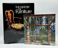 Lot of two hardcover books related to furniture and wood architecture shown together.