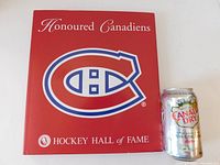 Front cover of the book showing the Montreal Canadiens logo and title Honoured Canadiens with Hockey Hall of Fame at the bottom.