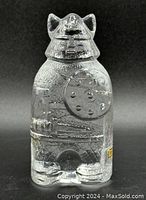 Front view of the clear crystal Viking figurine showing detailed helmet, shield, and textured body.