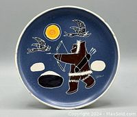 Full front view of the plate showing the hunter archer, birds in flight, sun, and background.
